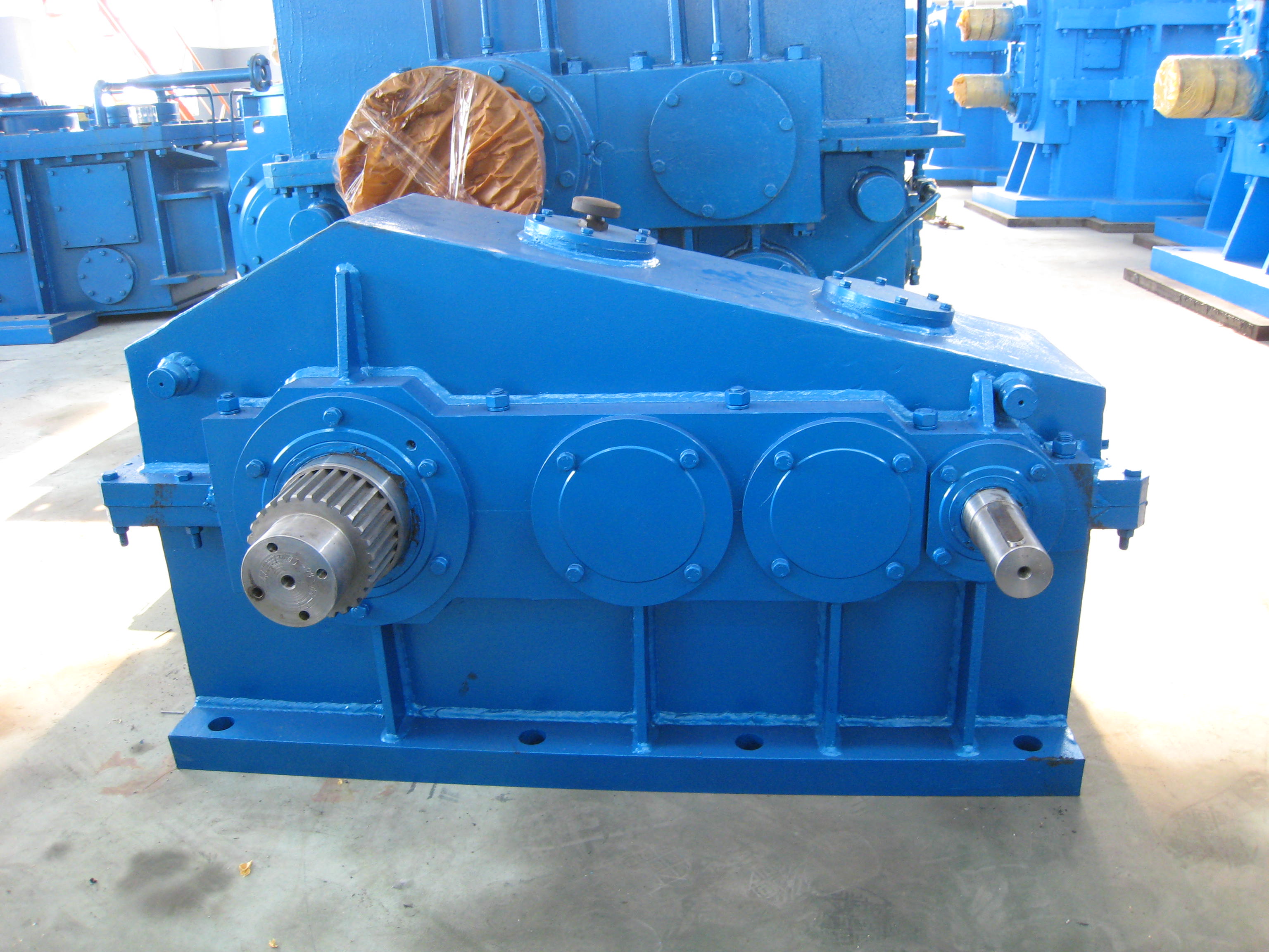 Representative crane and auxiliary-drive gearbox family imagery; the exact configuration varies by application.