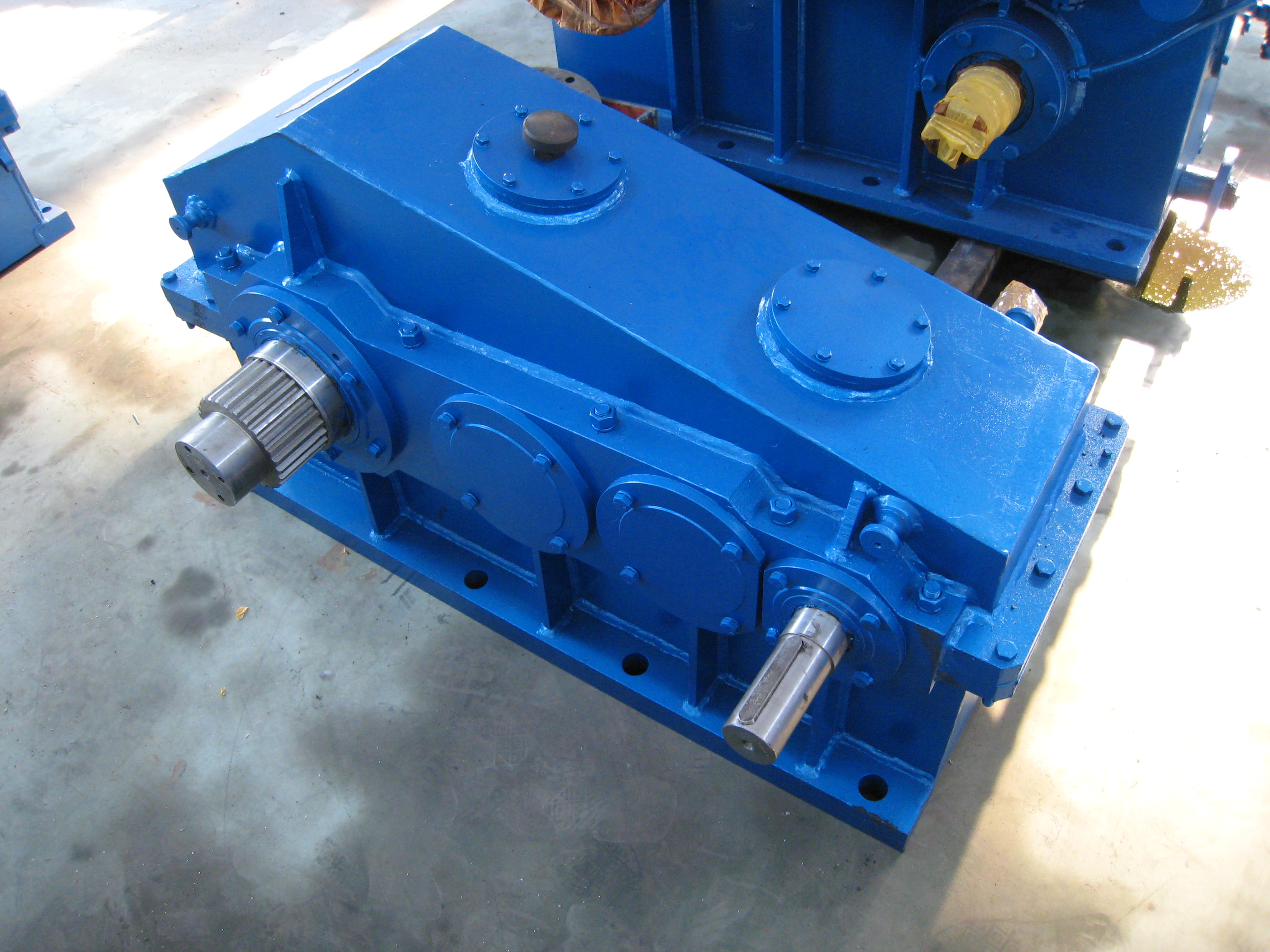 Representative crane and auxiliary-drive gearbox family imagery; the exact configuration varies by application.